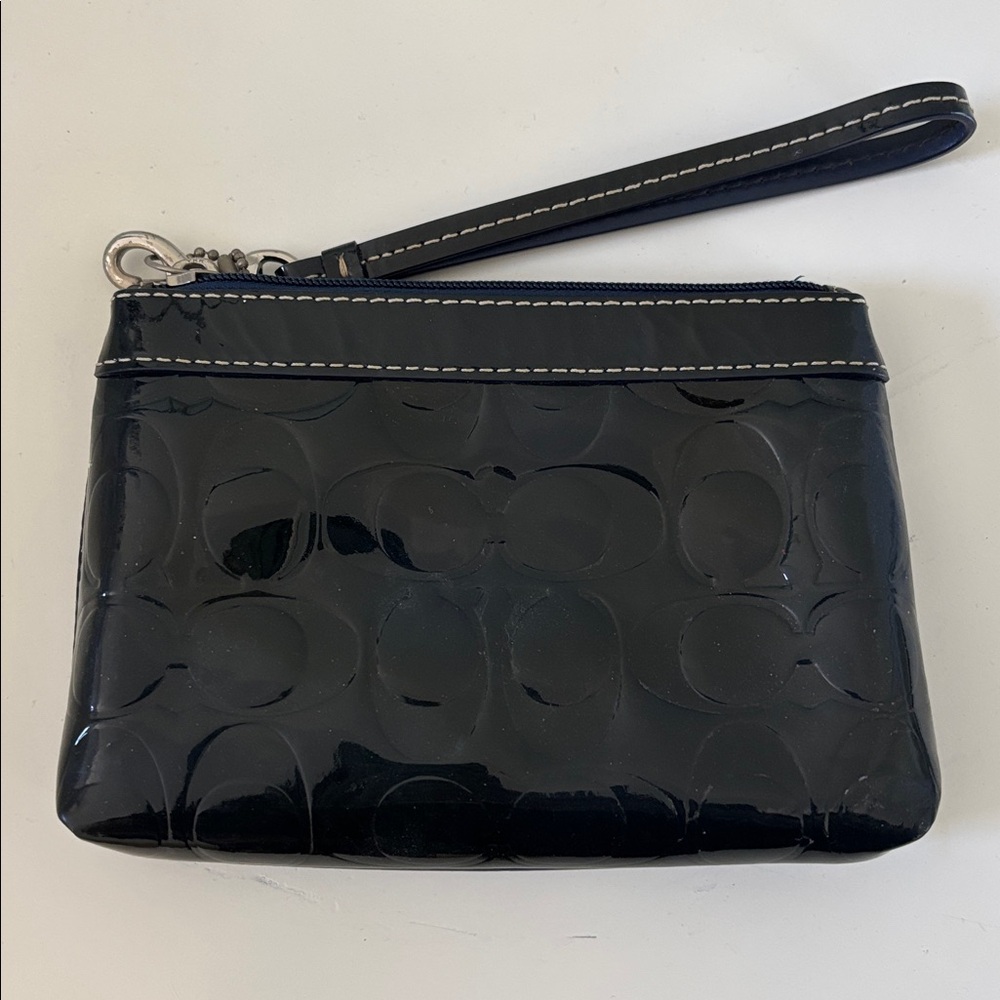 ⭐️ 3 for $20 - Bundle and save!!⭐️
COACH Navy Patent Leather Wristlet - Picture 2 of 8
